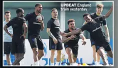  ??  ?? UPBEAT England train yesterday