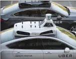  ?? JEFF SWENSEN — THE NEW YORK TIMES ARCHIVES ?? Uber says that even though it has the permit to test self-driving cars in California, it isn’t in a hurry to put its cars on the state’s roads.