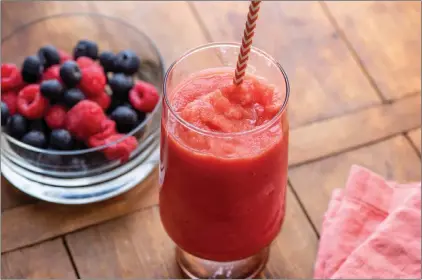  ?? THE ASSOCIATED PRESS ?? A watermelon­strawberry smoothie in New York. This drink is from a recipe by Katie Workman.