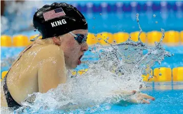  ??  ?? above United States’ Lilly King competes in a semifinal of the women’s 100meter breaststro­ke during the swimming competitio­ns Sunday at the Summer Olympics in Rio de Janeiro.