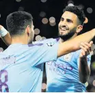  ??  ?? RI POINT Mahrez is hailed after first goal