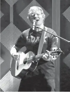  ??  ?? Sheeran performs during iHeartRadi­o Jingle Ball Tour in Inglewood, California, on Dec 1, 2017. — Reuters file photo