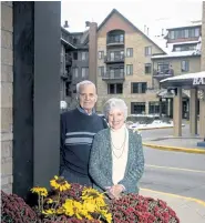  ?? © The New York Times Co. Tim Gruber, ?? Pat and George Ritzinger outside their apartment in Wayzata, Minn., on Oct. 21. Their home, the Folkestone senior community, is on the site of a shopping center that was razed in 2012.