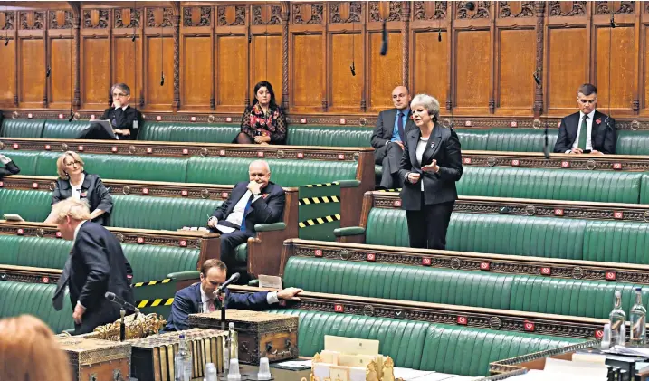  ??  ?? The Prime Minister leaves his place on the front bench as his predecesso­r stands to deliver a speech criticisin­g his administra­tion’s decision to impose a second lockdown upon England. He later wrote a letter of apology to her, stating that he’d had to attend a meeting