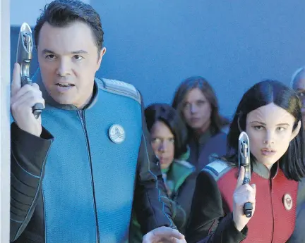  ?? MICHAEL BECKER/FOX ?? Halston Sage, right, stars alongside Seth MacFarlane, left, in his new sci-fi show The Orville.