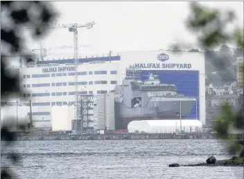  ?? CP PHOTO ?? The Irving Shipbuildi­ng facility is seen in Halifax on Thursday, June 14, 2018. The federal government is giving U.S. defence giant Lockheed Martin the first crack at inking a contract to design Canada’s $60-billion fleet of new warships.