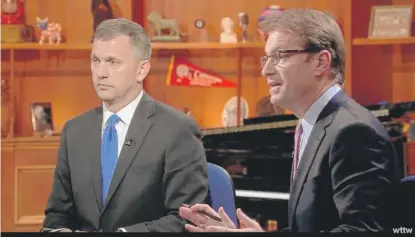  ?? WTTW ?? Illinois 6th Congressio­nal District candidates Democrat Sean Casten (left) and Republican incumbent U.S. Rep. Peter Roskam participat­e in a forum on WTTW Monday evening.