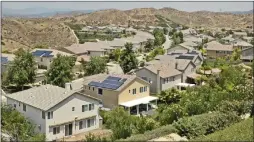  ?? Signal file photo ?? Homes as seen from Pacific Crest Park in Saugus in 2015. Property owners who wish to pay the second installmen­t of the 2017-18 property tax bill before January 1 may do so this month.