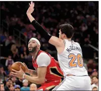  ?? AP/SETH WENIG ?? Anthony Davis of the New Orleans Pelicans scored 48 points and grabbed 17 rebounds in leading the Pelicans to a 123-118 overtime victory over the New York Knicks.