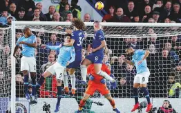  ?? Reuters ?? Chelsea’s David Luiz scores their second goal against Manchester City at Stamford Bridge, yesterday.