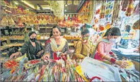  ?? PTI ?? Women shop ahead of Janamashta­mi festival in Jammu on Thursday.