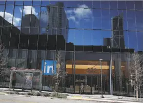  ?? Lea Suzuki / The Chronicle ?? Part of the vast San Francisco skyline is reflected in LinkedIn’s offices.