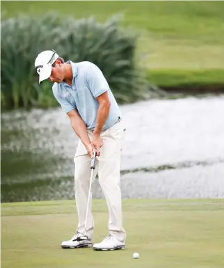  ??  ?? Kevin Kisner putts on the ninth green at the Dean & DeLuca Invitation­al golf tournament Friday. (AP)