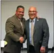  ?? TRENTONIAN FILE PHOTOS ?? Mayoral candidates Paul Perez, left, and Reed Gusciora end on a positive note at a debate at Mercer County Community College.