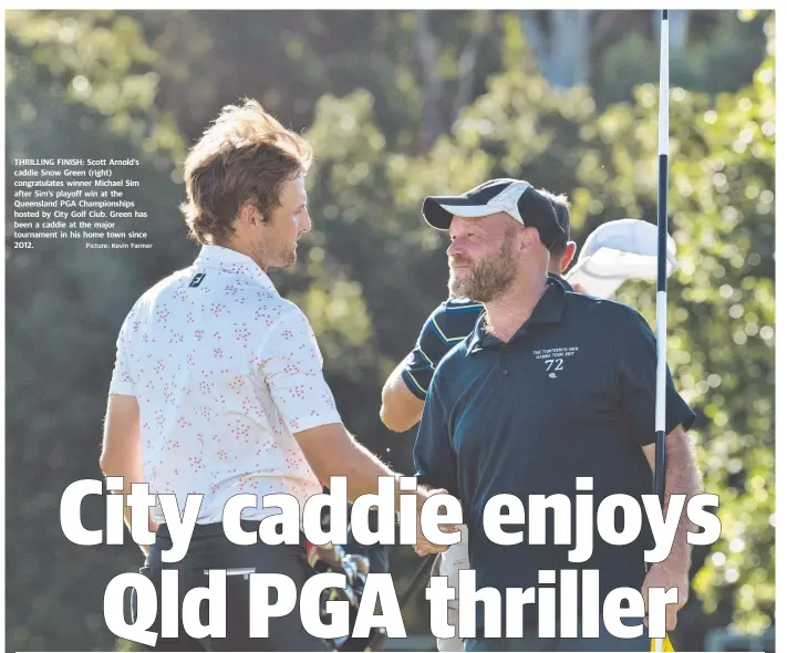  ?? Picture: Kevin Farmer ?? THRILLING FINISH: Scott Arnold's caddie Snow Green (right) congratula­tes winner Michael Sim after Sim’s playoff win at the Queensland PGA Championsh­ips hosted by City Golf Club. Green has been a caddie at the major tournament in his home town since 2012.