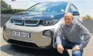  ?? Picture:DENIS DROPPA ?? CHARGE IT: Shaun Maidment with his i3, in which he covers up to 4,000km a month