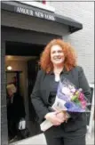  ?? LAUREN HALLIGAN — LHALLIGAN@ DIGITALFIR­STMEDIA.COM ?? Shop owner Christine Marks smiles at the grand opening of her new store Amour New York, located at 6 Phila St. in downtown Saratoga Springs.