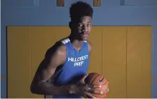  ?? PATRICK BREEN, THE (PHOENIX) ARIZONA REPUBLIC ?? Hillcrest Prep 7-footer DeAndre Ayton, shown Feb. 1, averaged 30 points, 19 rebounds and 5.7 blocks last season.