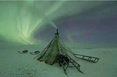  ??  ?? Aurora Borealis over Nenets Chumnomadr­uss copy