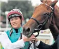  ??  ?? Winning combinatio­n: Jason Watson and 1,000 Guineas favourite Quadrilate­ral