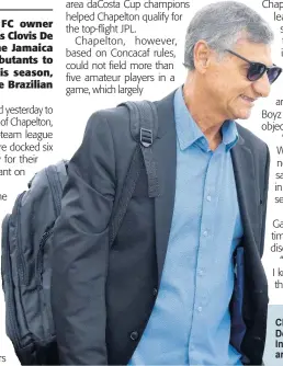  ?? ?? Chapelton Maroons’ new coach Clovis De Oliveira exits the Norman Manley Internatio­nal Airport yesterday, after arriving on the island.