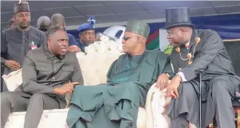  ?? ?? Vice President of Liberia, Jeremiah Kpoung ( left); his Nigerian counterpar­t, Kashim Shettima and Bayelsa State Governor, Douye Diri, during the governor’s inaugurati­on for a second term in office in Yenagoa… yesterday.