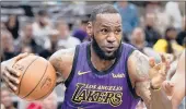  ?? DARREN ABATE/AP ?? The Los Angeles Lakers’ LeBron James drives against the San Antonio Spurs on Dec. 7 in San Antonio.