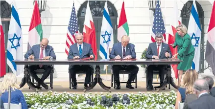  ??  ?? POSITIVE SIGNS: President Donald Trump presides over a South Lawn ceremony where Israel, Bahrain and the United Arab Emirates signed a general declaratio­n of principles named the Abraham Accords.