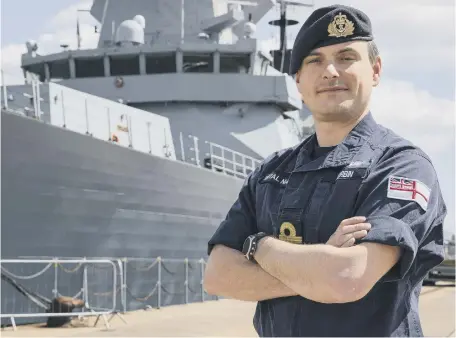  ?? ?? Lieutenant Commander Will Durbin in front of HMS Duncan