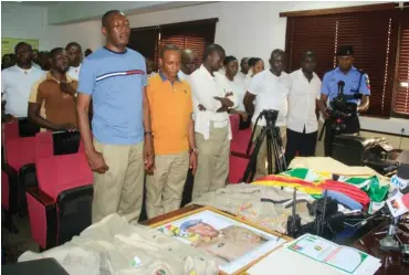  ??  ?? Members of the Peace Corps of Nigeria being paraded at the Force Headquarte­rs in Abuja yesterday for allegedly operating an illegal/unlawful security outfit. Photo: