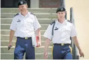  ?? [AP PHOTO] ?? Sgt. Bowe Bergdahl, right, and his attorney, Lt. Col. Franklin Rosenblatt, leave court after a hearing at the courtroom facility on Fort Bragg, N.C. Bergdahl, who was held captive by the Taliban for half a decade after abandoning his post, is expected...