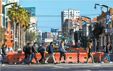  ?? Photos by Gabrielle Lurie / The Chronicle ?? S.F. is considerin­g rezoning the area around the Central Subway to spur job growth. The impact is debated.