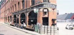  ??  ?? Be prepared: Bittles Bar and (right) a workman at Lurgan Golf Club