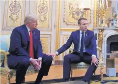  ?? JACQUELYN MARTIN/ASSOCIATED PRESS ?? President Donald Trump and French President Emmanuel Macron meeting inside the Elysee Palace in Paris on Saturday. Trump is joining other world leaders at centennial commemorat­ions of the end of World War I.