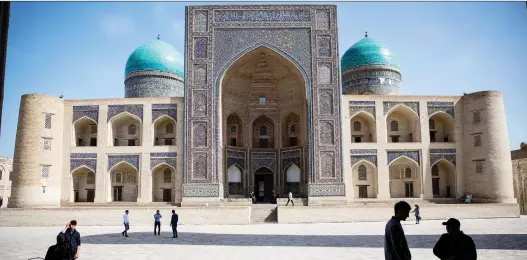  ?? PHOTOS: TAYLOR WEIDMAN/BLOOMBERG ?? The Mir-i-Arab Madrasa in Bukhara, Uzbekistan, a fantasy destinatio­n for architectu­re enthusiast­s who will revel in still-standing ancient cities.