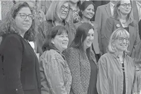  ?? KINGA BORONDY / TELEGRAM & GAZETTE ?? Legislator­s, from left, Rep. Natalie Higgins, D-Leominster, Rep. Trisha Farley-Bouvier, D-Pittsfield, Rep. Hannah Kahn, R-Shrewsbury, and Senate President Karen Spilka, D-Ashland, wear their denim to mark Denim Day in solidarity with survivors of sexual assault and violence during Sexual Assault Awareness Month, marked in April.