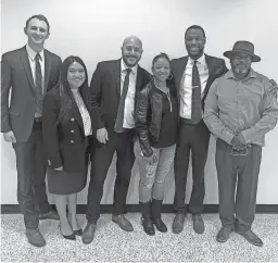  ?? PROVIDED BY RECLAIM YOUR FUTURE ?? From left, Cody Jackson, Samantha Rincon, Randal McDonald, Emily Harrison, Martin Hutchins and Eric Lewis are smiling moments after Keith Harrison found out he would be released from his prison sentence on Nov. 16.