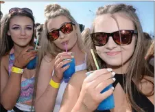  ?? Photo by Don MacMonagle ?? Cooling down in the sunshine are Donna Buckley, Ballyduff; Aoife Barrett, Causeway and Cora Fitzgerald, Lixnaw, while enjoying the Kerry Diocesan Youth Service annual Youth Day at the INEC Killarney on Sunday.