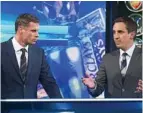  ??  ?? Point taken: Carragher listens to Neville