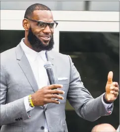  ?? Phil Long / Associated Press ?? LeBron James speaks at the I Promise School opening ceremony in Akron, Ohio on July 30.