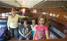  ??  ?? Riding the steam train are (from left) Helen Simmons, Lyn Clark, Debbie Brault and Kilah Simmons from Brisbane.