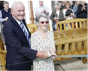  ??  ?? Denzil and Hazel Tipping cut the ribbon on the garden.