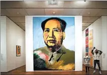  ?? JOHN J. KIM/CHICAGO TRIBUNE ?? Andy Warhol’s “Mao” is on display for the exhibit “Andy Warhol — From A to B and Back Again” at the Art Institute of Chicago.