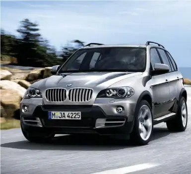  ??  ?? The X5 weighed as much as a Chevy Tahoe, but it still drove like a BMW, thanks in part to control-arm suspension.