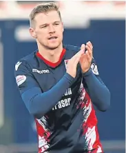  ??  ?? Ross County striker Billy Mckay saluted the service he has been getting from team-mates