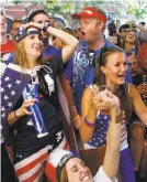  ?? Ed Andrieski / Associated Press 2014 ?? U.S soccer fans flocked to sports bars for the 2014 World Cup.