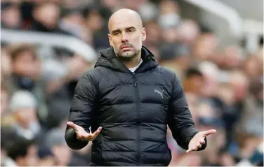  ?? File / Agence France-presse ?? ↑
Pep Guardiola is adamant the Manchester City players have not been affected by a poor run of just one victory in five games in all competitio­ns.