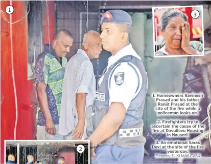  ?? ?? 1. Homeowners Ravinesh Prasad and his father Ranjit Prasad at the site of the fire while a policeman looks on.