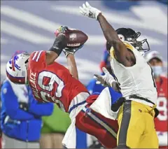  ?? Peter Diana/Post-Gazette ?? Bills cornerback Levi Wallace intercepts Ben Roethlisbe­rger late in the fourth quarter.