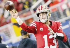  ?? Santiago Mejia/San Francisco Chronicle ?? San Francisco 49ers quarterbac­k Brock Purdy warms up ahead of an NFC Divisional Round playoff game against the Packers on Saturday.